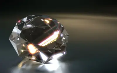 Błyszczący diament, symbol luksusu i trwałości, idealny jako kamienie inwestycyjne.